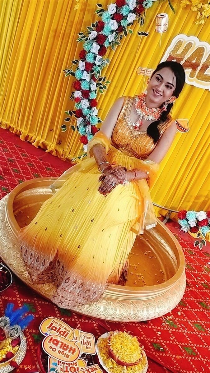 Haldi ceremony look, yellow gown with floral jewellery — Navi Mumbai