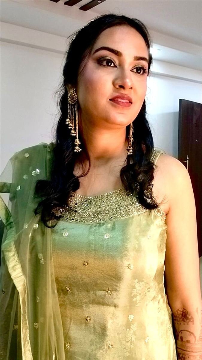 Mehendi ceremony look, sage green with full bridal mehendi — Navi Mumbai