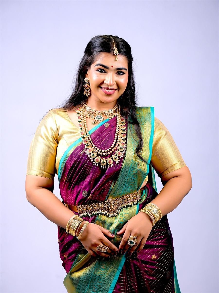 South Indian bridal makeup in purple Kanjeevaram silk saree with gold temple jewellery — Navi Mumbai