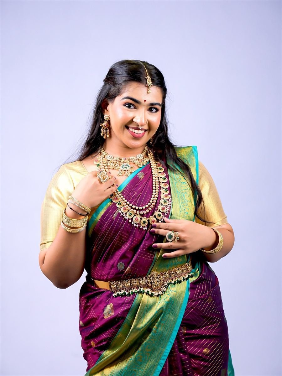 South Indian bridal look with vaddanam waist belt and layered temple jewellery — Mumbai